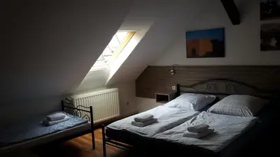 Ein Bett oder Betten in einem Zimmer der Unterkunft Pension Zentrum Riesa