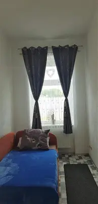 Ein Bett oder Betten in einem Zimmer der Unterkunft Ferienwohnung Hesse