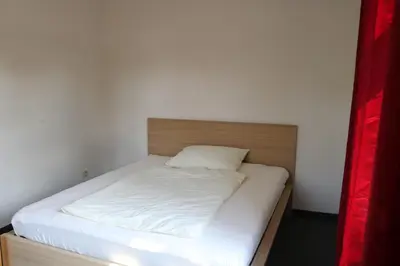 Ein Bett oder Betten in einem Zimmer der Unterkunft Ferienwohnung Post