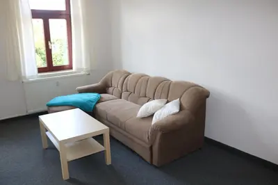 Ein Sitzbereich in der Unterkunft Ferienwohnung Post