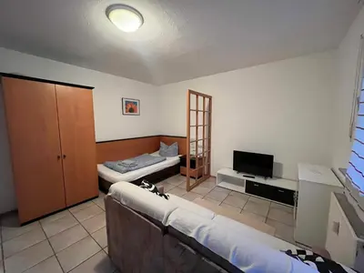 Ein Bett oder Betten in einem Zimmer der Unterkunft Apartmenthaus Home24