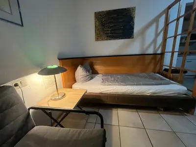 Ein Bett oder Betten in einem Zimmer der Unterkunft Apartmenthaus Home24