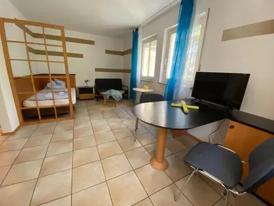 TV/Unterhaltungsangebot in der Unterkunft Apartmenthaus Home24