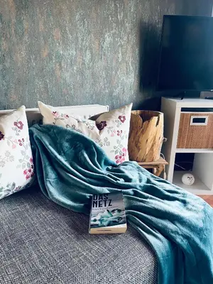TV/Unterhaltungsangebot in der Unterkunft Ferienwohnung „Am Gnaucks Hutberg“