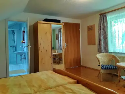 Ein Bett oder Betten in einem Zimmer der Unterkunft Pension Hänsel