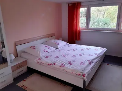 Ein Bett oder Betten in einem Zimmer der Unterkunft Pension Hänsel