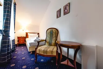 Ein Bett oder Betten in einem Zimmer der Unterkunft Historische Spitzgrundmühle