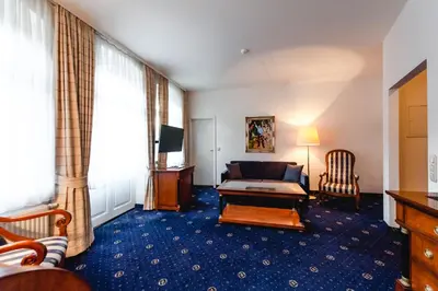 Ein Bett oder Betten in einem Zimmer der Unterkunft Historische Spitzgrundmühle
