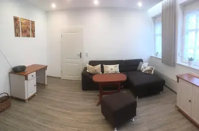 Ein Sitzbereich in der Unterkunft zentral gelegene top ausgestattete Wohnung