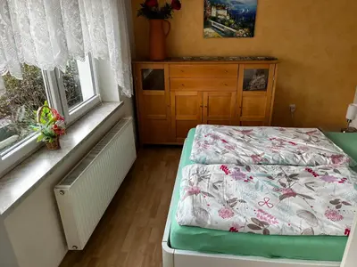 Ein Bett oder Betten in einem Zimmer der Unterkunft Kipsenblick