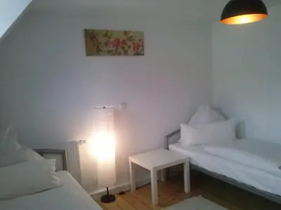Ein Bett oder Betten in einem Zimmer der Unterkunft Ferienwohnung Konrad - nahe Chemnitz