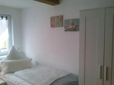 Ein Bett oder Betten in einem Zimmer der Unterkunft Ferienwohnung Konrad - nahe Chemnitz