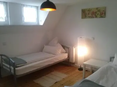 Ein Bett oder Betten in einem Zimmer der Unterkunft Ferienwohnung Konrad - nahe Chemnitz