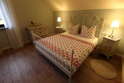 Ein Bett oder Betten in einem Zimmer der Unterkunft Ferienhaus 