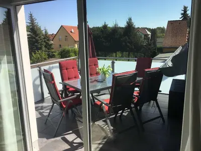 Ein Balkon oder eine Terrasse in der Unterkunft Ferienhaus 
