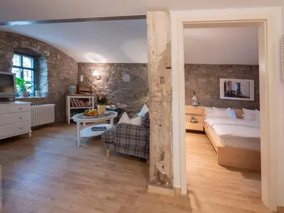 Ein Bett oder Betten in einem Zimmer der Unterkunft Landappartement Stritter