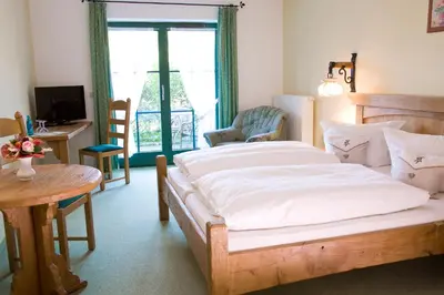 Ein Bett oder Betten in einem Zimmer der Unterkunft Forsthaus Luchsenburg