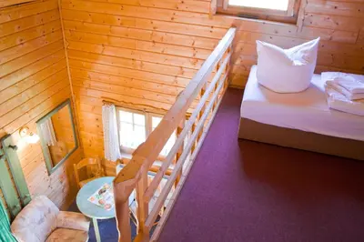 Ein Bett oder Betten in einem Zimmer der Unterkunft Forsthaus Luchsenburg