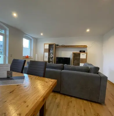 Ein Sitzbereich in der Unterkunft STADTOASE moderne Wohnungen mit Balkon, Komfort und Ruhe, Für Monteure geeignet, Free WiFi