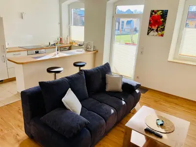 Ein Sitzbereich in der Unterkunft STADTOASE moderne Wohnungen mit Balkon, Komfort und Ruhe, Für Monteure geeignet, Free WiFi