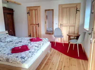 Ein Bett oder Betten in einem Zimmer der Unterkunft Ferienwohnung Porschendorf