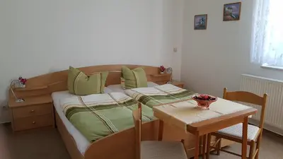 Ein Bett oder Betten in einem Zimmer der Unterkunft Ferienwohnung Richter