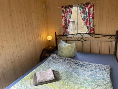 Ein Bett oder Betten in einem Zimmer der Unterkunft Bauwagen Villa Maibeere