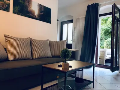 Ein Sitzbereich in der Unterkunft Ferienwohnungen mit Terrasse in Zwingernähe - Hilger Rentals