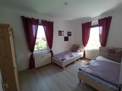 Ein Bett oder Betten in einem Zimmer der Unterkunft Ferienwohnungen Familie Winter