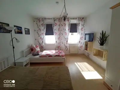Ein Bett oder Betten in einem Zimmer der Unterkunft Ferienwohnungen Familie Winter