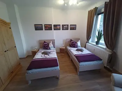 Ein Bett oder Betten in einem Zimmer der Unterkunft Ferienwohnungen Familie Winter