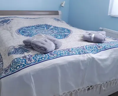 Ein Bett oder Betten in einem Zimmer der Unterkunft Pension Marina