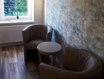Ein Sitzbereich in der Unterkunft Pension Marina