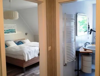 Ein Bett oder Betten in einem Zimmer der Unterkunft Pension Marina