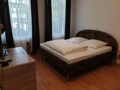Ein Bett oder Betten in einem Zimmer der Unterkunft Avenue Apartment - Hilbersdorfer Straße
