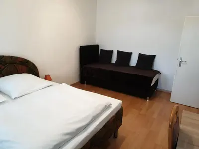 Ein Bett oder Betten in einem Zimmer der Unterkunft Avenue Apartment - Hilbersdorfer Straße