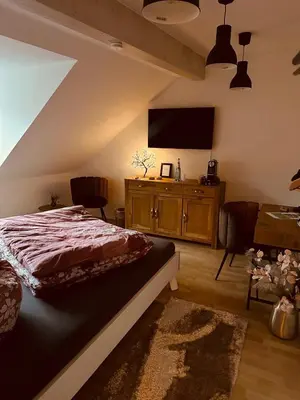 Ein Bett oder Betten in einem Zimmer der Unterkunft KM - Altstadtapartments Freiberg