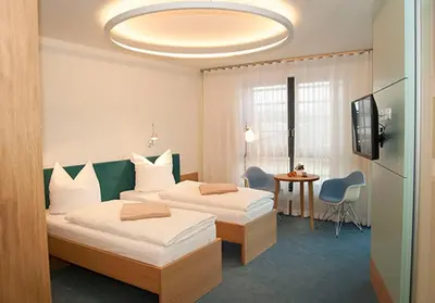 Ein Bett oder Betten in einem Zimmer der Unterkunft TraumHaus im Elsterpark