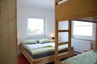 Ein Bett oder Betten in einem Zimmer der Unterkunft Villa Kreisel