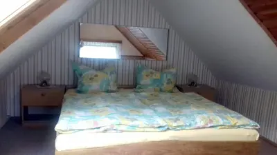 Ein Bett oder Betten in einem Zimmer der Unterkunft Fewo Thieme in Bielatal