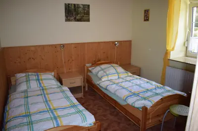 Ein Bett oder Betten in einem Zimmer der Unterkunft Ferienwohnung Waldmühle