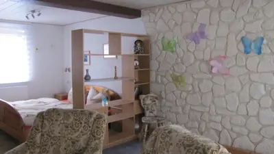 Ein Bett oder Betten in einem Zimmer der Unterkunft Feriendomiziel Läsker