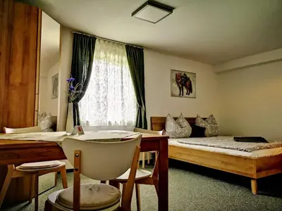 Ein Bett oder Betten in einem Zimmer der Unterkunft Landhaus Kirchberg