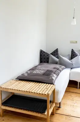 Ein Bett oder Betten in einem Zimmer der Unterkunft Ferienwohnungen im Gasthaus Zur Grünen Wiese