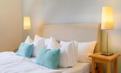 Ein Bett oder Betten in einem Zimmer der Unterkunft Altendorfer Vorwerk - Ferienapartments