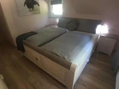 Ein Bett oder Betten in einem Zimmer der Unterkunft Matzelhaus