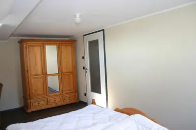 Ein Bett oder Betten in einem Zimmer der Unterkunft Quartier78