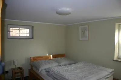 Ein Bett oder Betten in einem Zimmer der Unterkunft Quartier78