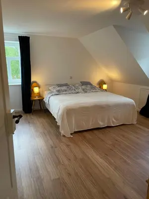 Ein Bett oder Betten in einem Zimmer der Unterkunft Rittergut Hirschbach - Verwalterhaus