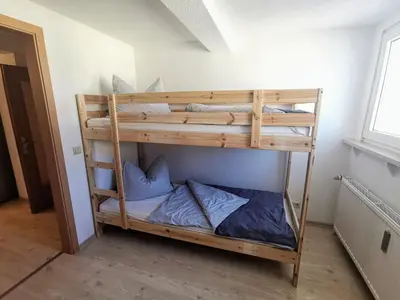 Ein Bett oder Betten in einem Zimmer der Unterkunft Moderne 3BR Netflix,Kaffee,Wifi,Parken